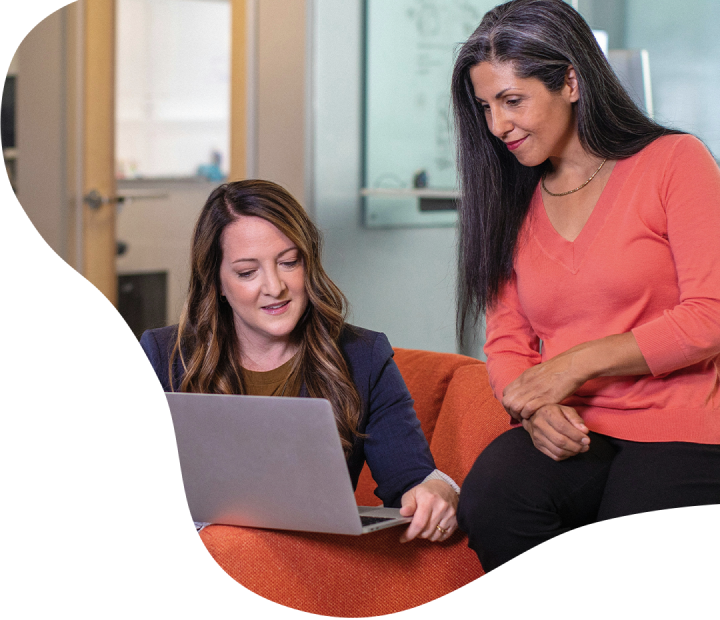 women looking at laptop