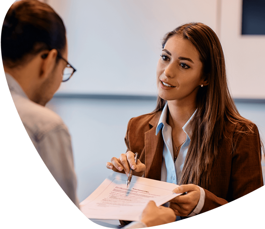 woman showing document to man